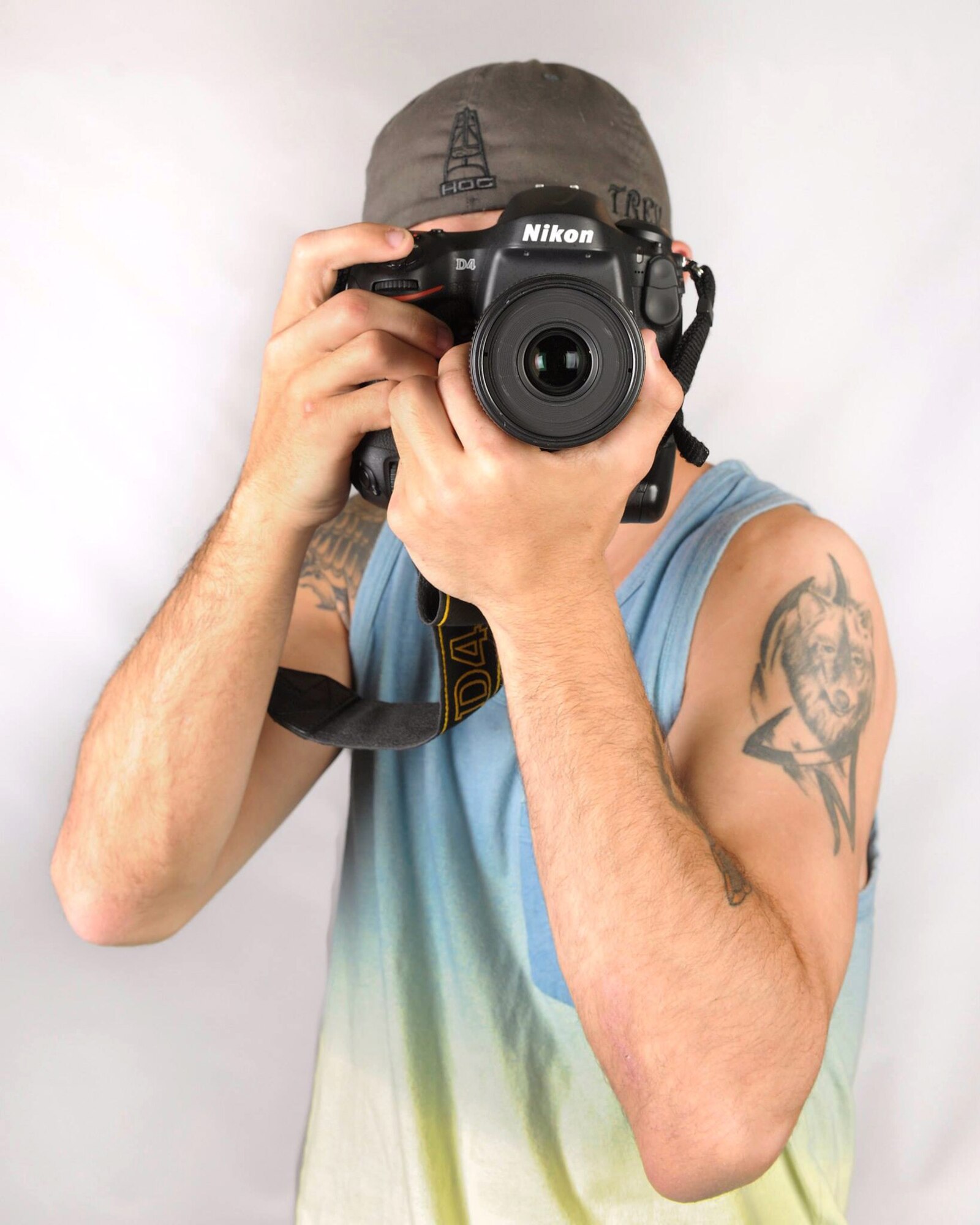 Senior Airman Trevor McBride, 48th Fighter Wing Public Affairs photojournalist, takes a photo to promote his installation photography contest “Liberty Top Shot,” at Royal Air Force Lakenheath, England, May 16, 2014. McBride created this program to give the military community the opportunity to showcase their photography skills and submit their best photos of life in Europe. (U.S. Air Force photo by Senior Airman Nigel Sandridge/Released) 