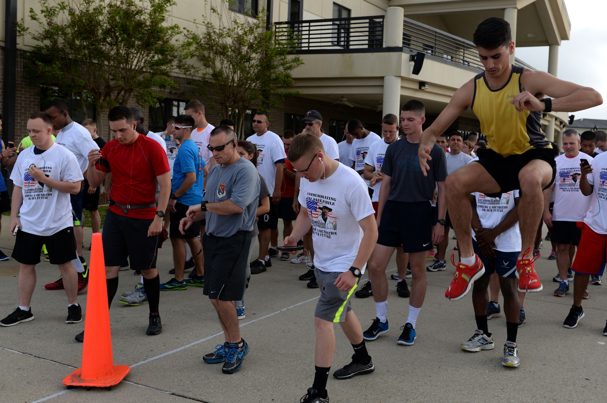 Participants line up to start the Holt Memorial 5K Run/Walk April 10, 2015 at the Levitow Training Support Facility, Keesler Air Force Base, Miss. More than 200 Keesler personnel participated in the run honoring Airman 1st Class Antoine Holt, who received his technical training at the 334th Training Squadron and was killed in 2004 while deployed in Iraq. The event was sponsored by the African-American Heritage Committee and 334th TRS. (U.S. Air Force photo by Airman 1st Class Duncan McElroy)