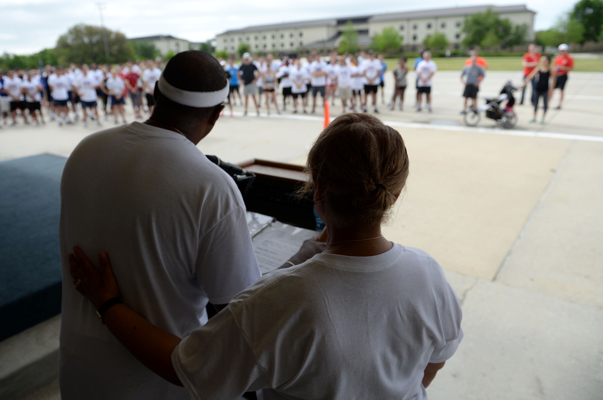 Michael Holt and Courtney Garmon, parents of Airman 1st Class Antoine Holt, speak to participants before the Holt Memorial 5K Run/Walk April 10, 2015 at the Levitow Training Support Facility, Keesler Air Force Base, Miss. More than 200 Keesler personnel participated in the run honoring Holt, who received his technical training at the 334th Training Squadron and was killed in 2004 while deployed in Iraq. The event was sponsored by the African-American Heritage Committee and 334th TRS. (U.S. Air Force photo by Airman 1st Class Duncan McElroy)