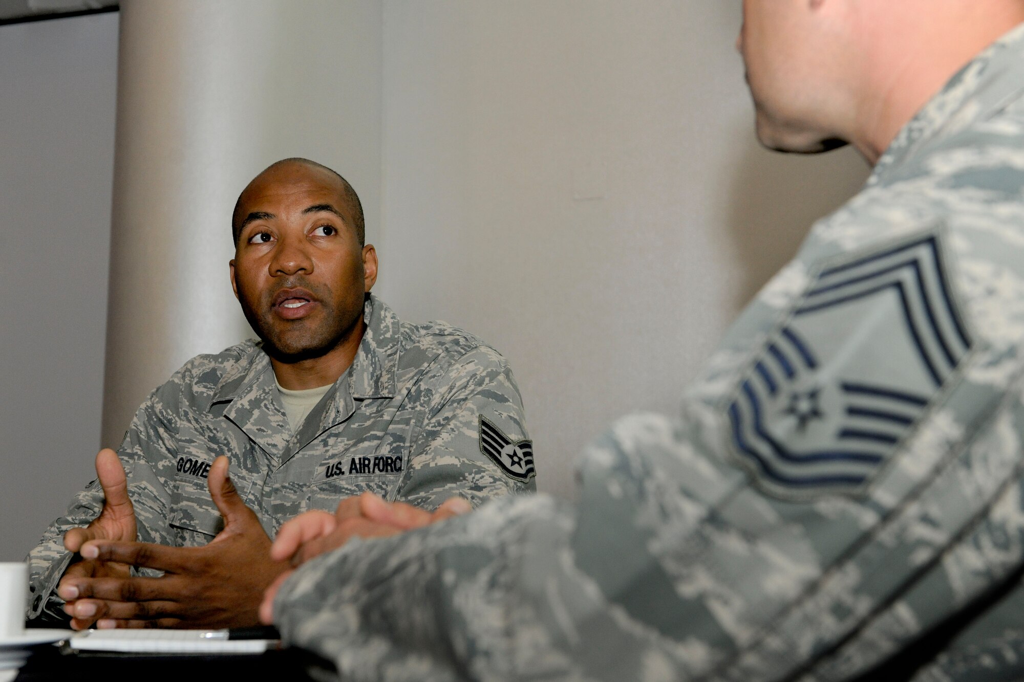 Staff Sgt. George Gomes, 39th Air Base Wing emergency action controller, speaks with Chief Master Sgt. Zachary Capogna, 39th Maintenance Squadron superintendent, during a speed mentoring event April 13, 2015, at Incirlik Air Base, Turkey. The event served as an avenue for Airmen with a passion for mentorship to connect with mentors. (U.S. Air Force photo by Senior Airman Krystal Ardrey/Released)