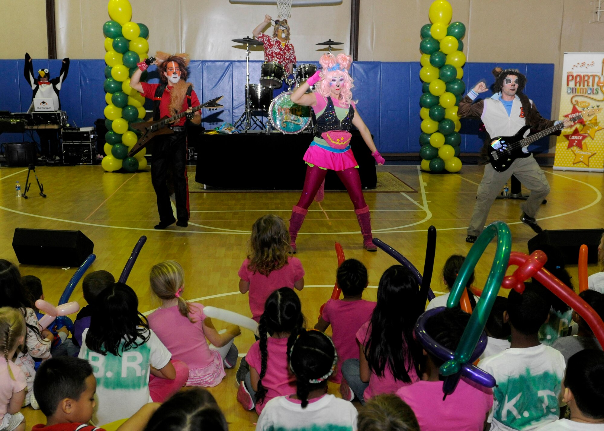 The Party Animals perform in concert before a group of Team Incirlik youth April 10, 2015, at Incirlik Air Base, Turkey. The Party Animals are an interactive Rock 'n Roll Musical group, which consists of four characters: Kaiya the Kangaroo, Walter the Fox, Brandon the Bear and Lance the Lion. (U.S. Air Force photos by Senior Airman Krystal Ardrey/Released) 