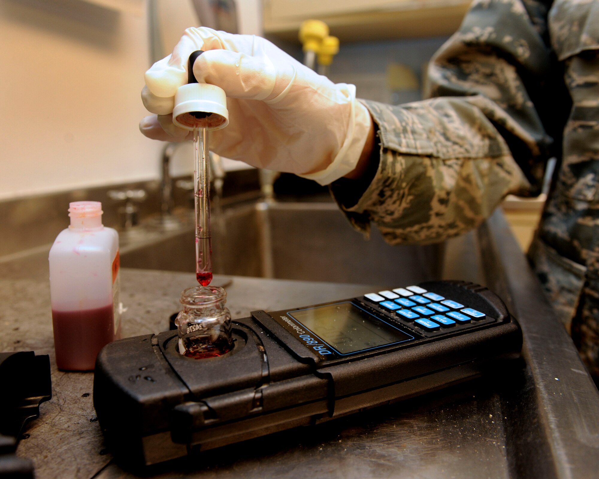 Senior Airman Joanna Aranyavong, 39th Medical Operations Squadron bioenvironmental engineer technician, tests the pH value of a water sample April 9, 2015, at Incirlik Air Base, Turkey. Aranyavong routinely tests Incirlik’s water from several sources to check the levels of pH, chlorine, fluoride, and bacteriological contaminants. (U.S. Air Force photo by Senior Airman Krystal Ardrey/Released)