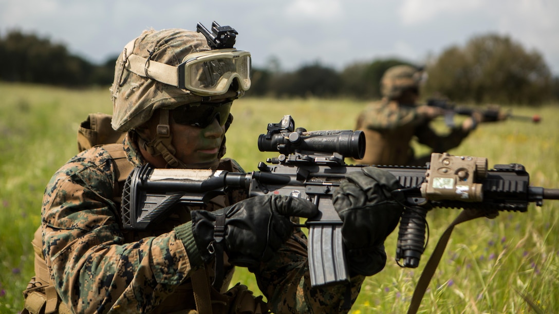 U.S. Marine Corps Lance Cpl. Christopher Geraci, an automatic rifleman with Special-Purpose Marine Air-Ground Task Force Crisis Response-Africa, posts security during an assault training exercise near Lisbon, Portugal, April 10, 2015. Marines stationed out of Moron Air Base, Spain, traveled to Portugal to utilize a variety of different ranges and training exercises alongside with the Portuguese Marines. After a week of training together, Marines and Fuzileiros were more familiarized with each other’s tactics and operating procedures in case of future joint operations.