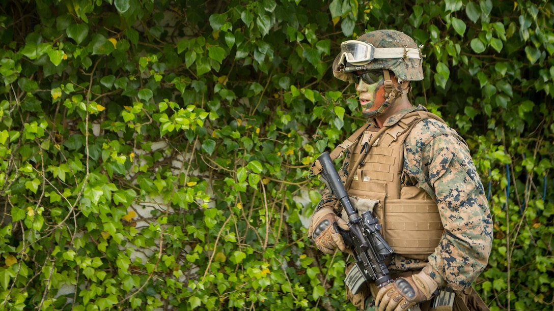 U.S. Marine Corps Lance Cpl. Joshua Willis, a team leader with Special-Purpose Marine Air-Ground Task Force Crisis Response- Africa, moves to an objective during an assault training exercise near Lisbon, Portugal, April 10, 2015. Marines stationed out of Moron Air Base, Spain, traveled to Portugal to utilize a variety of different ranges and training exercises alongside with the Portuguese Marines. After a week of training together, Marines and Fuzileiros were more familiarized with each other’s tactics and operating procedures in case of future joint operations.