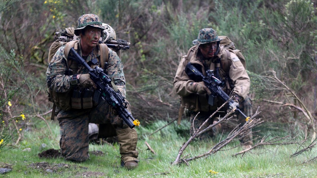 Marines with Company C, 1st Reconnaissance Battalion, provide security for their team during a simulated casualty evacuation aboard Joint Base Lewis-McChord, Washington, April 10, 2015. Marines with the company operated in remote locations of the wilderness and provided surveillance of the surrounding area to paint the commander a picture of the battlefield. During the patrol, the reconnaissance men navigated through several kilometers of thick brush and provided surveillance on numerous named areas of interest. The patrol was one of many exercises the company will complete as part of a combat readiness evaluation in preparation for an upcoming deployment.
(U.S. Marine Corps photo by Sgt. Joseph Scanlan / released)