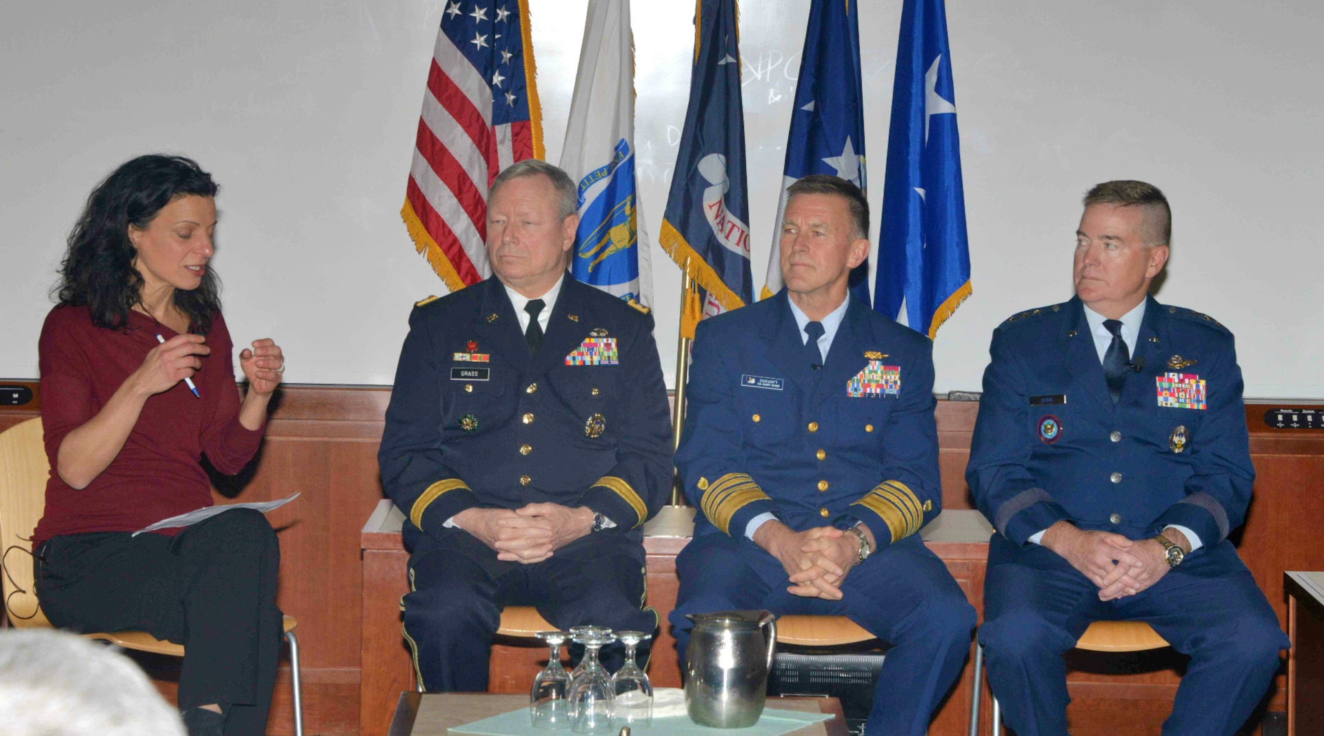 Army Gen. Frank J. Grass, the chief of the National Guard Bureau, prepares to answer a question from moderator Juliette Kayyem, Harvard Lecturer, during a forum as Coast Guard Adm. Paul Zukonft, commandant, U.S. Coast Guard and Lt. Gen. Michael Dubie, deputy commander, U.S. Northern Command listens during a panel discussion on the military's role in disaster response at Harvard University's John F. Kennedy School of Government.