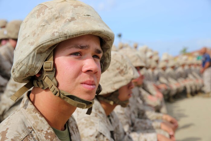 Recruit Adam J. LaVine, Platoon 3263, Mike Company, 3rd Recruit Training Battalion, awaits instruction on how to rappel down a 60-foot tower at Marine Corps Recruit Depot San Diego, April 10. LaVine is a St. Louis native and was recruited out of Recruiting Station St. Louis. Today, all male recruits recruited from recruiting stations west of the Mississippi are trained at MCRD San Diego. The depot is responsible for training more than 16,000 recruits annually. Company M is scheduled to graduate from recruit training on April 24.