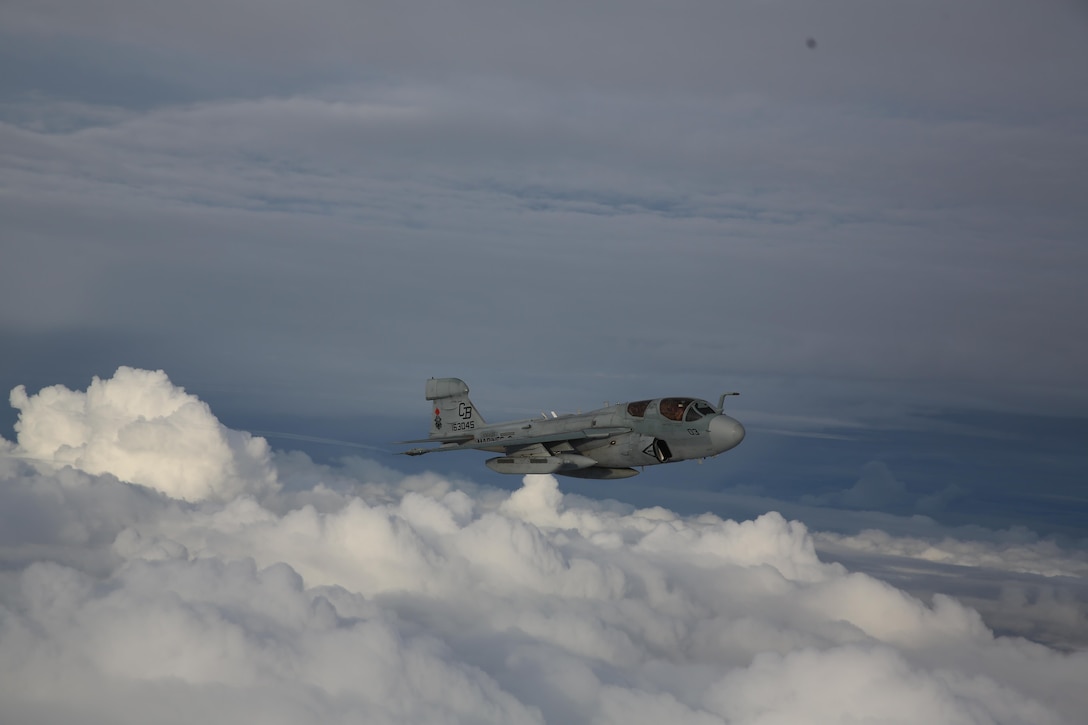 Naval aviators with Marine Tactical Electronic Warfare Training Squadron 1 take to the sky in an EA-6B Prowler during routine training above Eastern North Carolina, April 14, 2015. VMAQT-1 student pilots and electronics countermeasures officers train to perform dynamic maneuvers while focusing on communication and radar jamming.