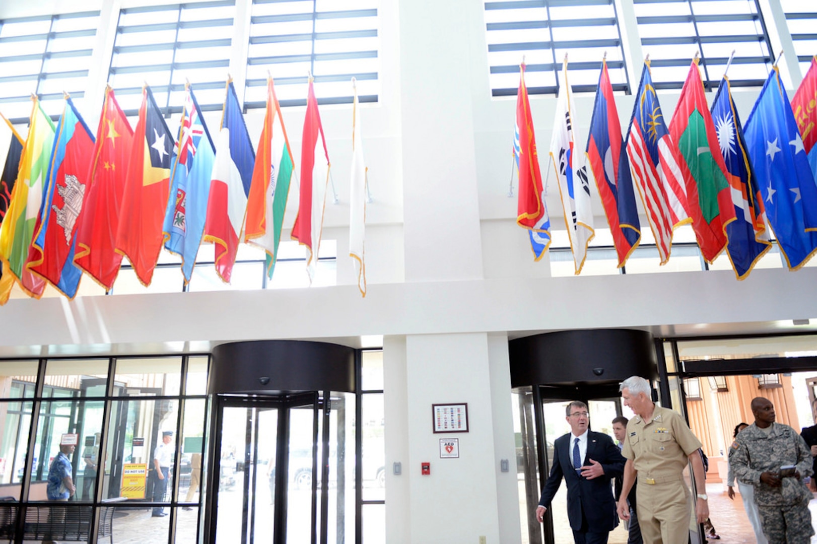 In this file photo, Defense Secretary Ash Carter speaks with Navy Adm. Samuel J. Locklear III at U.S. Pacific Command headquarters at Camp Smith, Hawaii April 12, 2015. Three days later, Locklear joined other Defense Department leaders on Capitol Hill for a hearing on maintaining the U.S. military’s technological edge. 