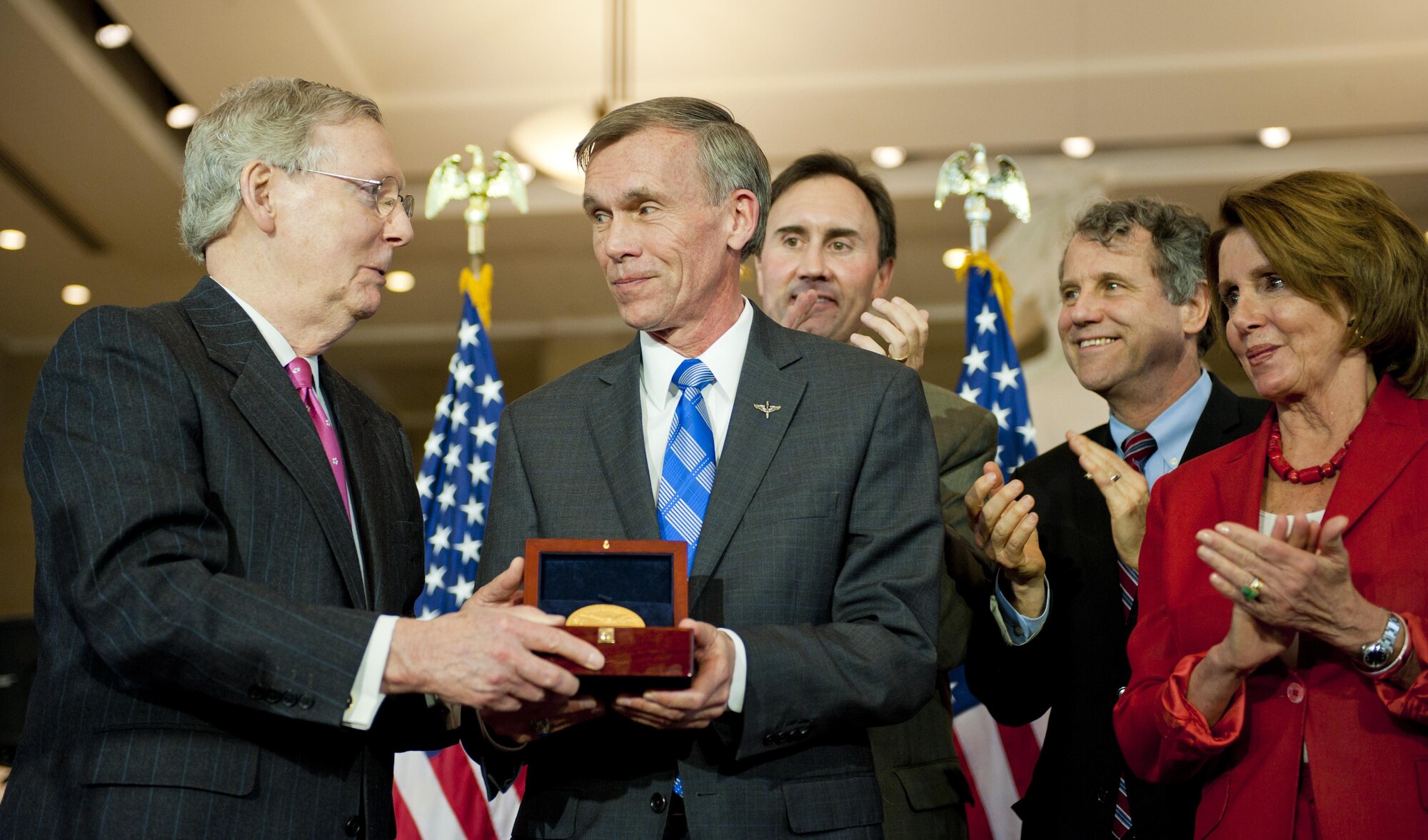 Retired Lt. Gen. John “Jack” Hudson, the National Museum of the U.S. Air Force director, accepts the Congressional Gold Medal on behalf of the Doolittle Tokyo Raiders April 15, 2015, at the U.S. Capitol Visitor’s Center Emancipation Hall. The medal, created by the U.S. Mint, is the highest civilian honor Congress can give, on behalf of the American people, and was presented in recognition of the Doolittle Tokyo Raiders’ outstanding heroism and service to the U.S. during World War II. (U.S. Air Force photo/Tech. Sgt. Anthony Nelson)