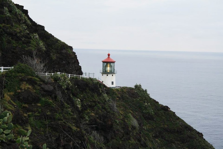 Makapu’u Lighthouse was built by the Corps in 1909 on a 600-foot sea cliff overlooking Makapu’u Beach in southeast Oahu. Makapu’u Point is an important location passed by all ships moving between Honolulu and the U.S. Mainland. The critical need for this light was demonstrated in August 1906 when the 27,000-ton S.S. Manchuria ran up on a reef off the point. Congress had already appropriated $60,000 for the light on October 1, 1909. The lens for this light was one of the wonders of the Pacific. Press clips of the time noted that the lens, which had been exhibited at the Jamestown Exposition, was one of the most expensive in the world. 

The lighthouse is 46-feet-tall (14 meters) and was fully automated in 1974.  It is still an active U.S. Coast Guard navigation aid in use today. 
