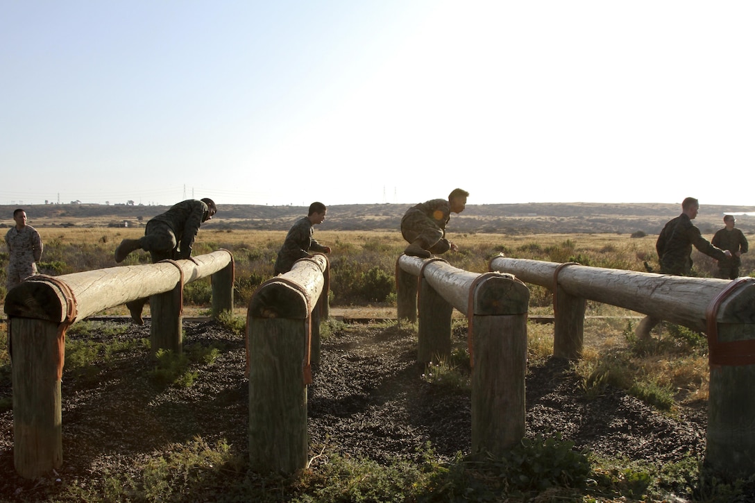 MARINE CORPS BASE CAMP PENDLETON, Calif. – United States Marine Corps officer candidates from Orange County, Los Angeles and San Diego complete an obstacle course during Officer Candidate School Prep aboard the installation April 11. OCS Prep is a three-day event modeled to help candidates prepare for the mental and physical challenges of OCS. (U.S. Marine Corps photo by Sgt. Vanessa Jimenez) 
