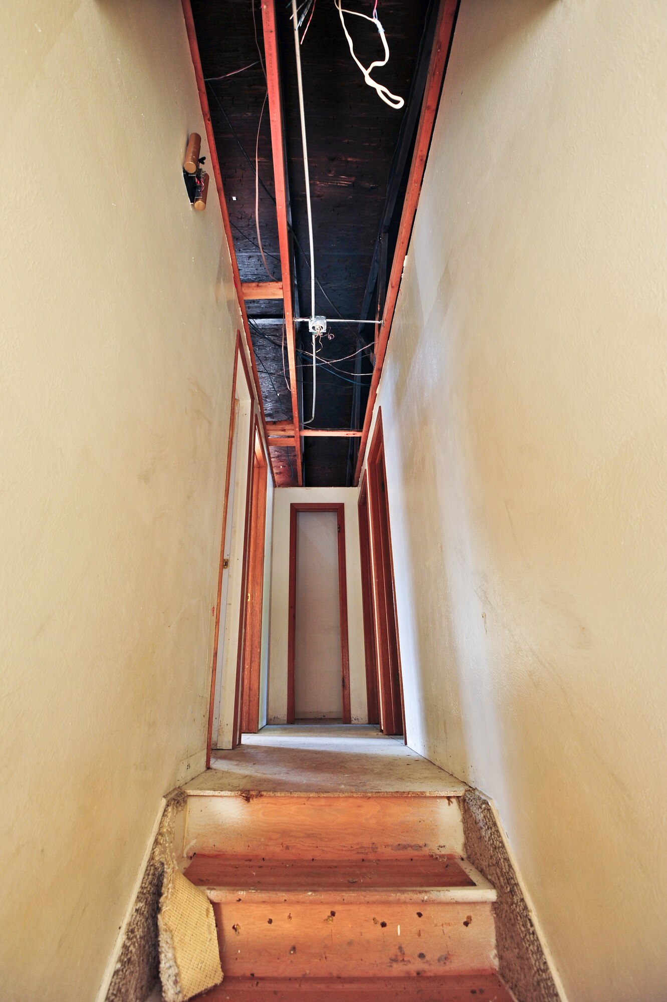 Ceiling and carpet removed because of fire and smoke damage in Air Force Reserve Master Sgt. David Hodge's house April 14, 2015, in Colorado Springs, Colo. Hodge is assigned to the 6th Space Operations Squadron.
(U.S. Air Force photo/Tech. Sgt. Nicholas B. Ontiveros)