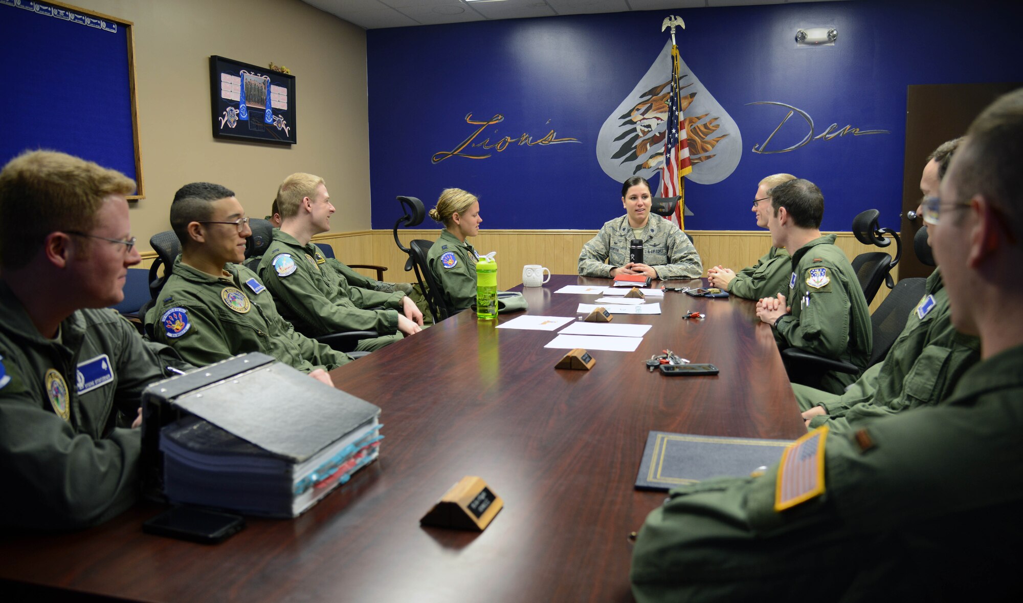Members of the 10th Missile Squadron meet prior to dispatching to the missile field March 16, 2015, at Malmstrom Air Force Base, Mont. Before each dispatch, missileers meet with each other to discuss any pressing matters. (U.S. Air Force photo/ Airman 1st Class Dillon Johnston)