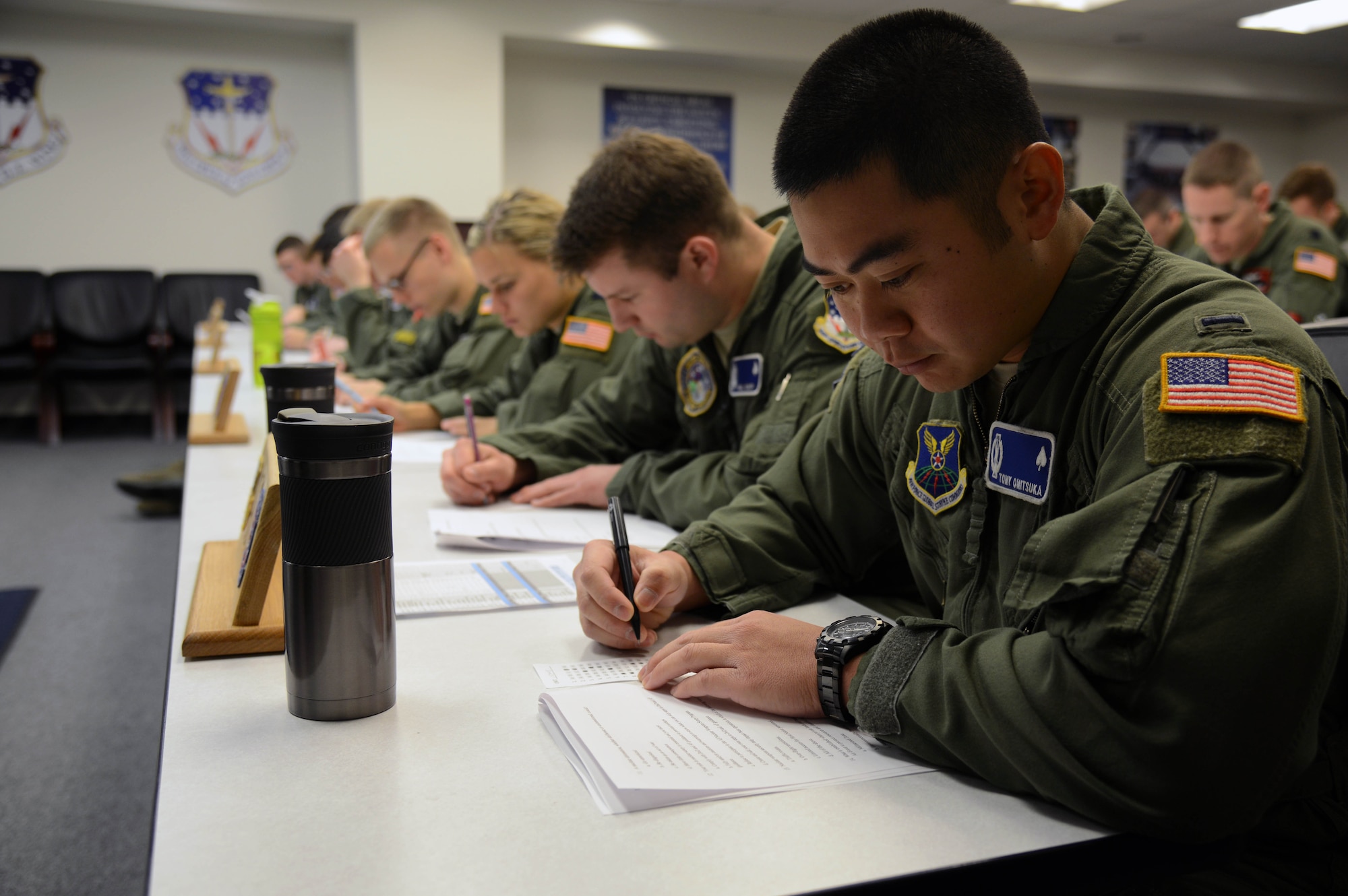 1st Lt. Tony Onitsuka, 10th Missile Squadron flight commander, takes a knowledge check test March 16, 2015, at Malmstrom Air Force Base, Mont. Missileers keep their skills and knowledge sharp in order to minimize mistakes in the missile field. (U.S. Air Force photo/ Airman 1st Class Dillon Johnston)