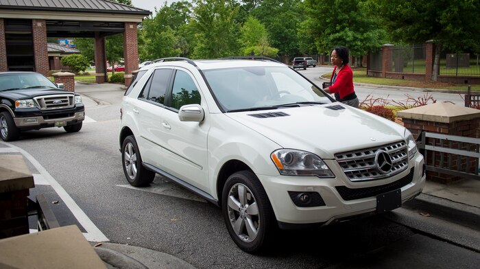 Shelia Reed, 628th Comptroller Squadron unit program coordinator, hands out Holocaust remembrance cards to members of Joint Base Charleston April 16, 2015, at the Dorchester Gate on Joint Base Charleston, S.C. There were 1,000 total cards given out that day. Each card represented 6,000 people that lost their lives in the Holocaust. (U.S. Air Force photo/Airman 1st Class Clayton Cupit)