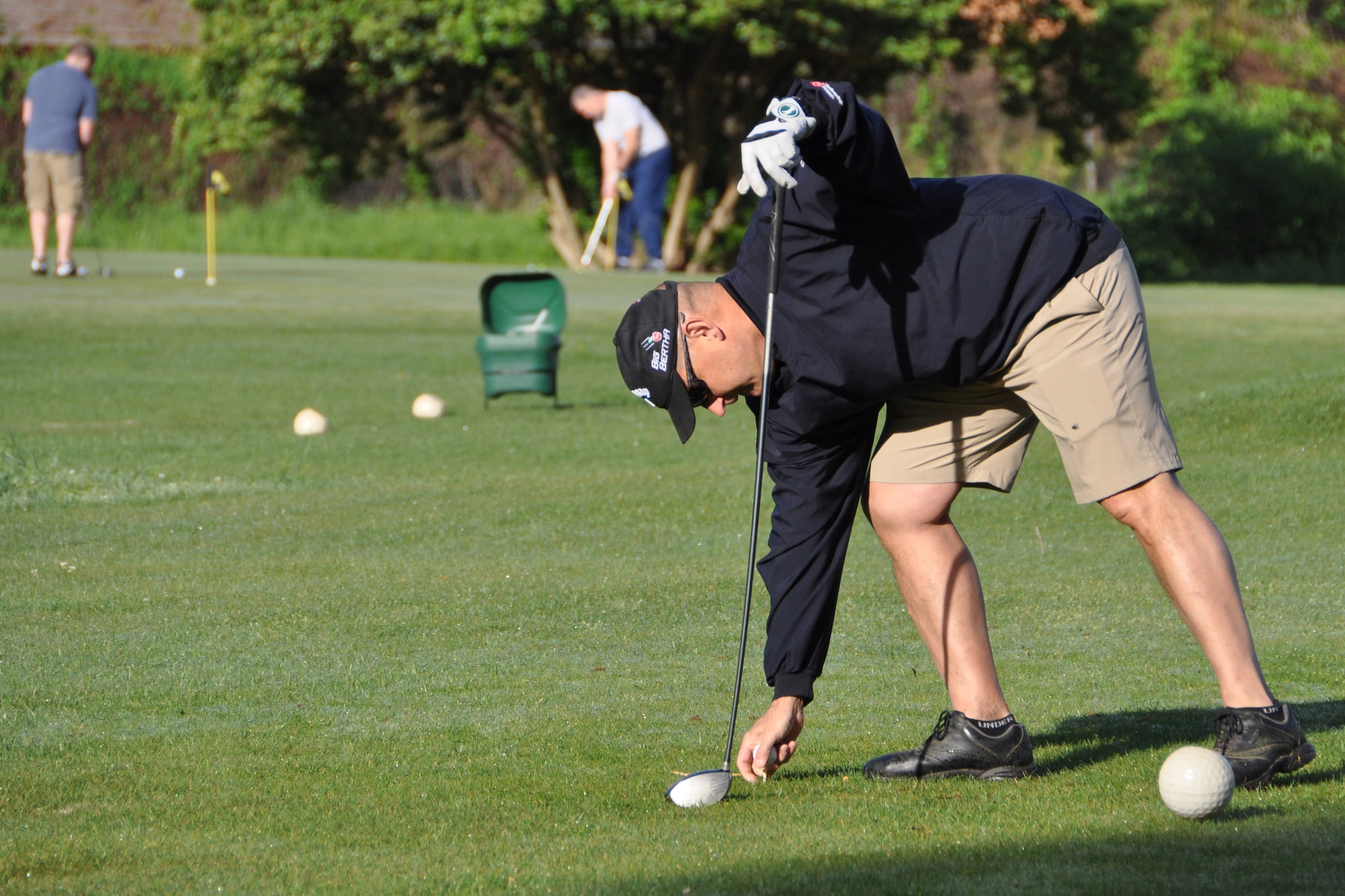 Mark Geer, 307th Mission Support Group, prepares to tee off during the 307th Bomb Wing Family Day Golf Tournament at Fox Run Golf Course on Barksdale Air Force Base, La. The golf tournament was one of many team events competing for Olympic style medals on April 11th. (U.S. Air Force photo by Master Sgt. Mary Hinson/Released)