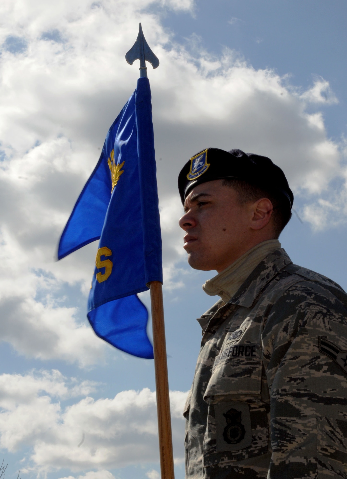 Airman 1st Class Eliezer Morales, 111th Security Forces Squadron, Horsham Air Guard Station, Pennsylvania, secures the unit's flag April 11, 2015, at  Gettysburg National Military Park. Morales was one of nearly 60 Guardsmen from the 111th Attack Wing’s security forces squadron who participated in a four-day team building and skills-training event, April 9 – 12, 2015, at the state’s joint-force training center at Fort Indiantown Gap, Pennsylvania and at Gettysburg National Military Park. (U.S. Air National Guard photo by Tech. Sgt. Andria Allmond/Released)