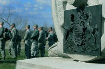 Members of the 111th Security Forces Squadron, Horsham Air Guard Station, Pennsylvania, stop to listen to a speaker during a ruck march at Gettysburg National Military Park, April 11, 2015. Nearly 60 Guardsmen from the 111th Attack Wing’s security forces squadron participated in a four-day team building and skills-training event, April 9 – 12, 2015, at the state’s joint-force training center at Fort Indiantown Gap and at Gettysburg National Military Park.  (U.S. Air National Guard photo by Tech. Sgt. Andria Allmond/Released)