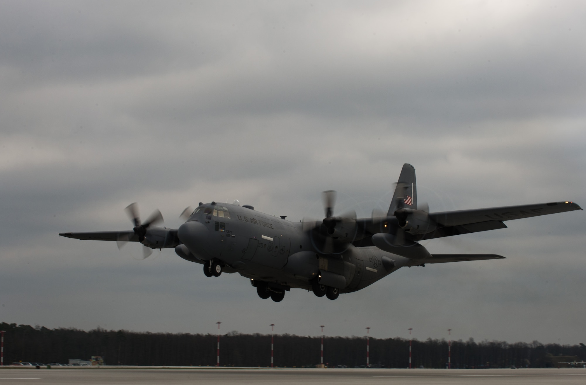 A C-130H legacy assigned to the 302nd Airlift Wing, flies takes off from Powidz Air Base, Poland, April 15, 2015. Two U.S. Reserve C-130Hs from the 302nd AW arrived to Powidz to fly alongside their U.S. active duty and Polish counterparts. (U.S. Air Force photo/Senior Airman Jonathan Stefanko)