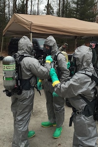 Air National Guard and Air Force Reserve emergency management specialist conduct training on responding to hazardous materials while at the Alpena Combat Readiness Training Center, Mich., April 10, 2015. Emergency management Airmen from six states recently gathered in Alpena to conduct a series of training exercises and classes to maintain their skill proficiency. (U.S. Air National Guard photo)