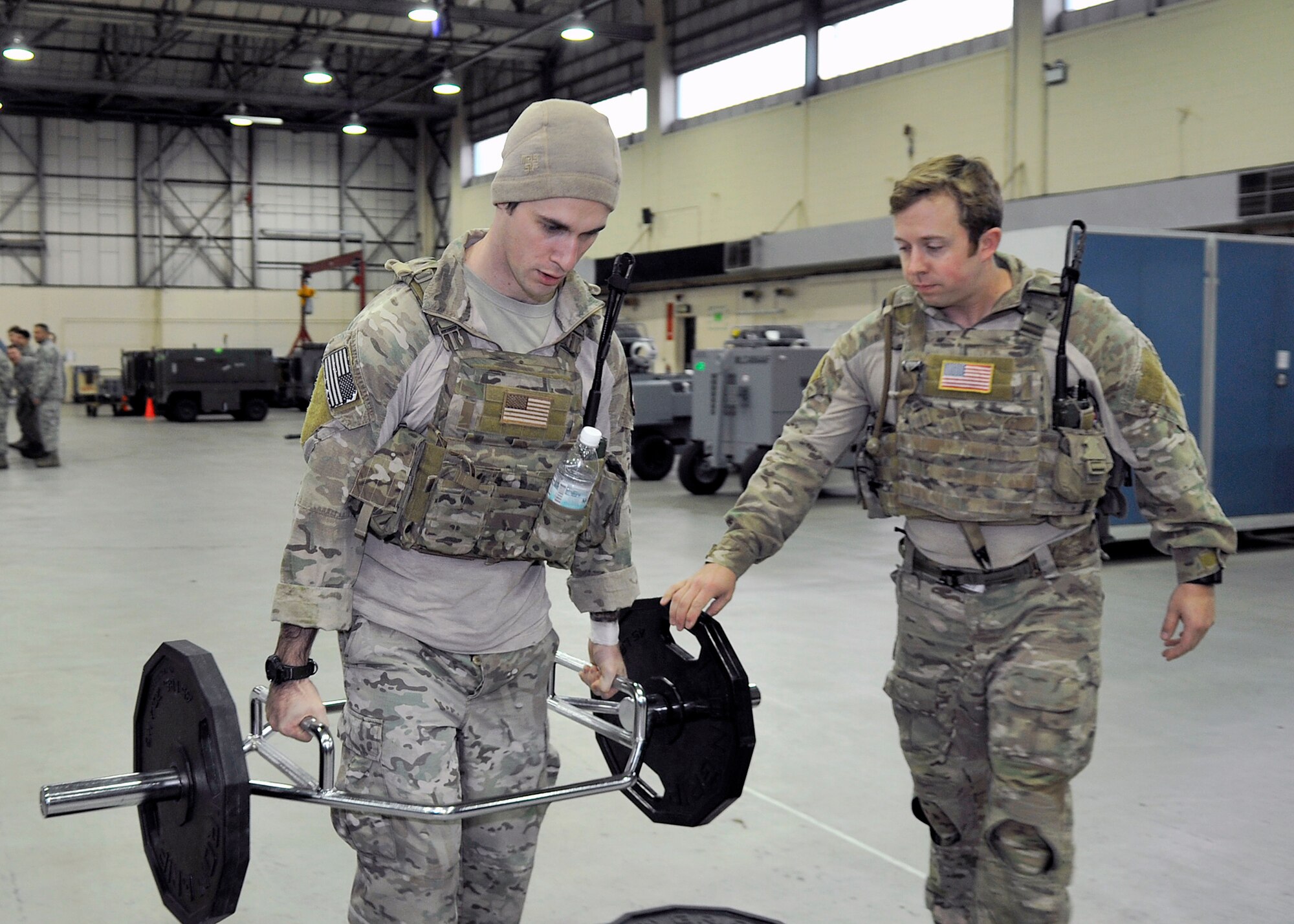 Air Commandos from the 321st Special Tactics Squadron participate in a challenge during the Monster Mash April 10, 2015 on RAF Mildenhall, England. The Monster Mash consisted of various events such as navigating across a “lava” pit, pulling a Humvee and a blind weapons assembly. (U.S. Air Force photo by Airman 1st Class Kyla Gifford)