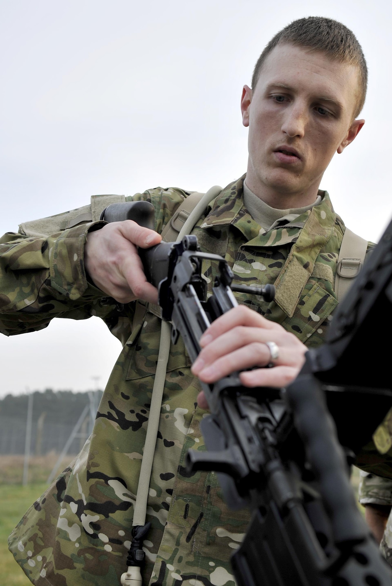 An Air Commando from the 321st Special Tactics Squadron participates in a weapons assembly challenge during the Monster Mash April 10, 2015 on RAF Mildenhall, England. A Monster Mash is a long-standing special tactics tradition which combines event designed to test strength, stamina and teamwork skills. (U.S. Air Force photo by Airman 1st Class Kyla Gifford)