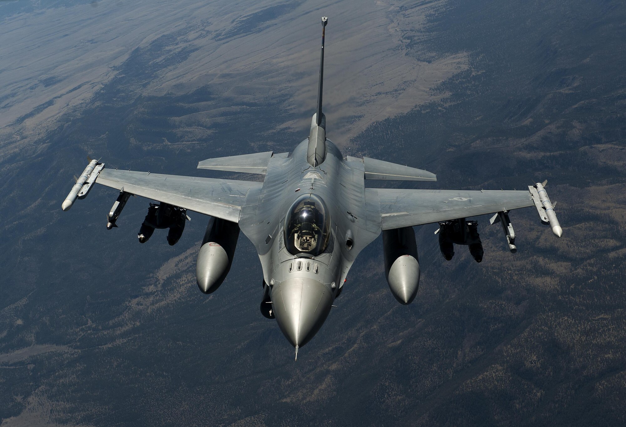 An F-16 Fighting Falcon, from the Arizona Air National Guard's 162nd Wing, dismounts after refueling from a KC-135 Stratotanker, from the 161st Air Refueling Wing, April 8, 2015, near Tucson, Arizona. The F-16 took part in a flying mission that included Iraqi and Dutch aircraft who were conducting upgrade training. International F-16 training has been accomplished at Tucson since 1990. Find other great F-16 images from this set in next month's issue of Airman Magazine. Check them out at http://airman.dodlive.mil. (U.S. Air Force photo/Staff Sgt. David Salanitri)
