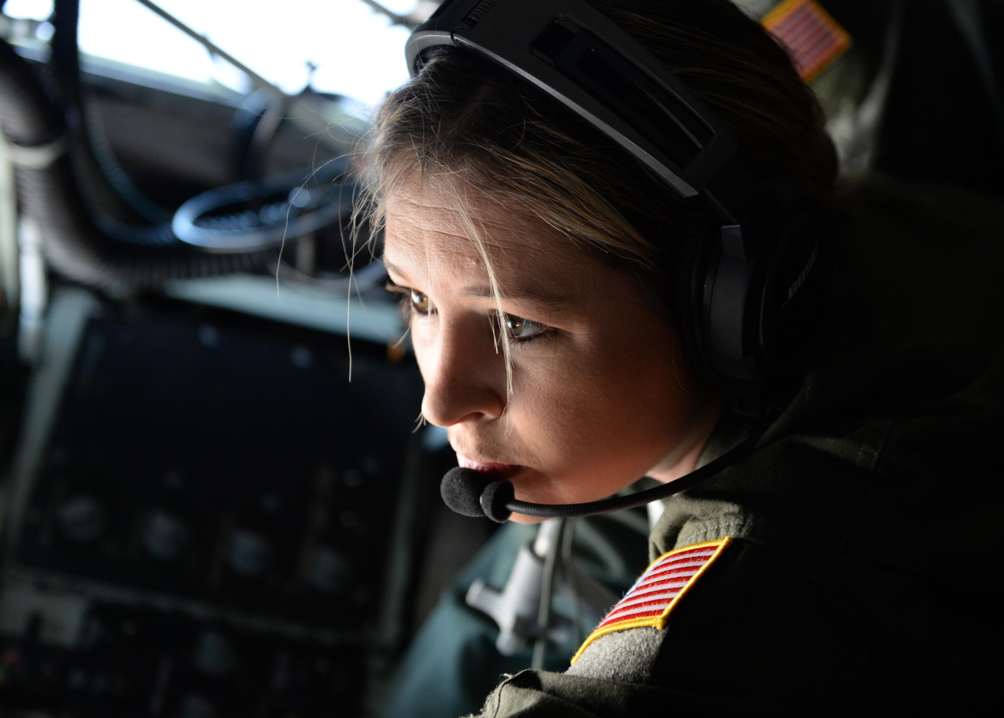 Staff Sgt. Amanda Walls, KC-135 Stratotanker boom operator student, runs through her pre-flight checklist on her final check ride, April 10, 2015. Boom operator students go through a four month course where they are given five flights and a final check ride to determine whether they’re ready to be a qualified boom operator. (U.S. Air Force photo/Airman 1st Class Nathan Clark)