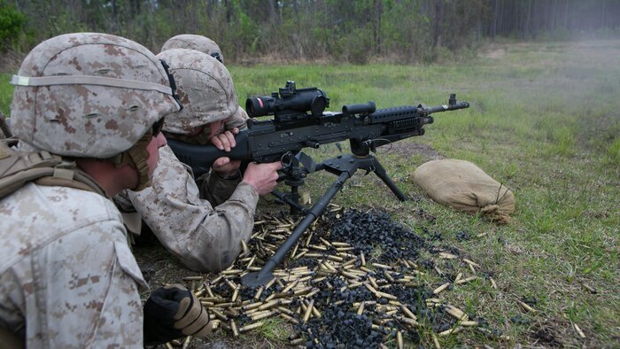 Light armored vehicle crewmen with 2nd Light Armored Reconnaissance Battalion man a crew-served M240 Bravo medium machine gun during a live-fire platoon attack exercise on Marine Corps Base Camp Lejeune, North Carolina, April 15, 2015. The unit utilized machine guns, which stood in for the battalion’s light armored vehicles for the exercise, but the weapon systems still provided an opportunity for Marines to maintain their combat skills.