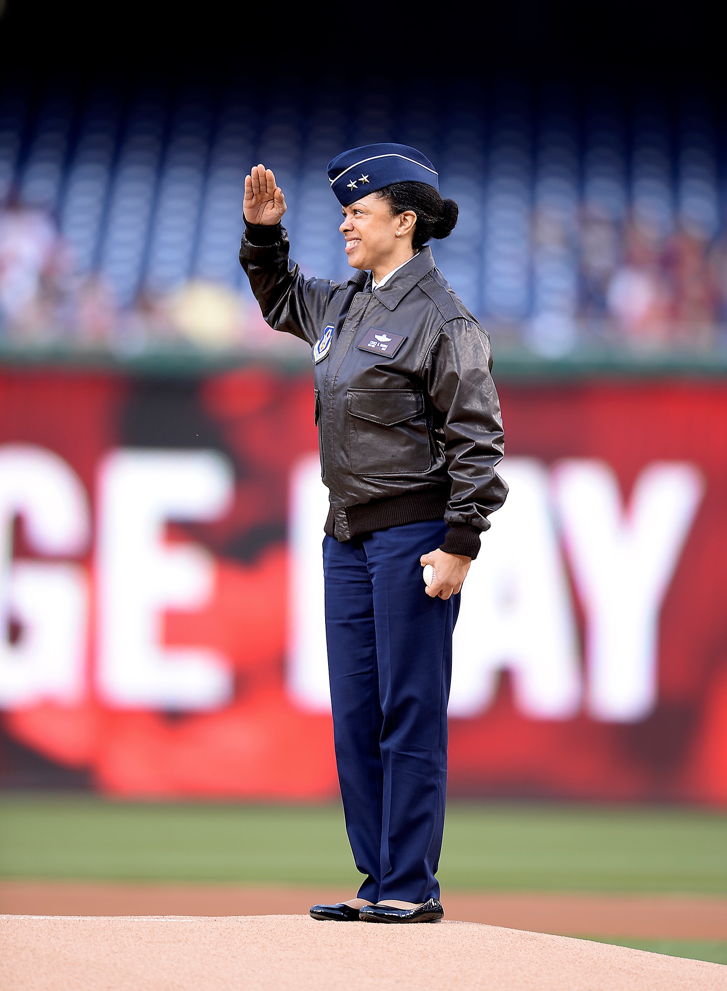 Maj. Gen. Stayce D. Harris, the commander of the 22nd Air Force, Air Force Reserve Command, presented the game ball to the pitcher before the Washington Nationals vs. Philadelphia Phillies game in Washington, April 17, 2015.  Harris, the highest-ranking black female officer in the Air Force, is presenting in honor of black heritage day at Nationals Park Stadium.  She also represented the Air Force Reserve for its 67th birthday.  (U.S. Air Force photo/Scott M. Ash)