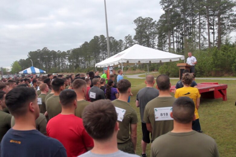 Maj. Gen. Robert Hedelund, commanding general of 2nd Marine Aircraft Wing, speaks to participants before the start of the Marine Corps Air Station Cherry Point and 2nd MAW Sexual Assault Awareness Month Commemorative 5K, April 17, 2015.
The event drew nearly 1,000 Marines, Sailors and Department of Defense employees who ran the 3.1 mile course along Rifle Range Road to show solidarity with sexual assault survivors and a shared commitment to eradicating sexual violence across the Marine Corps.  