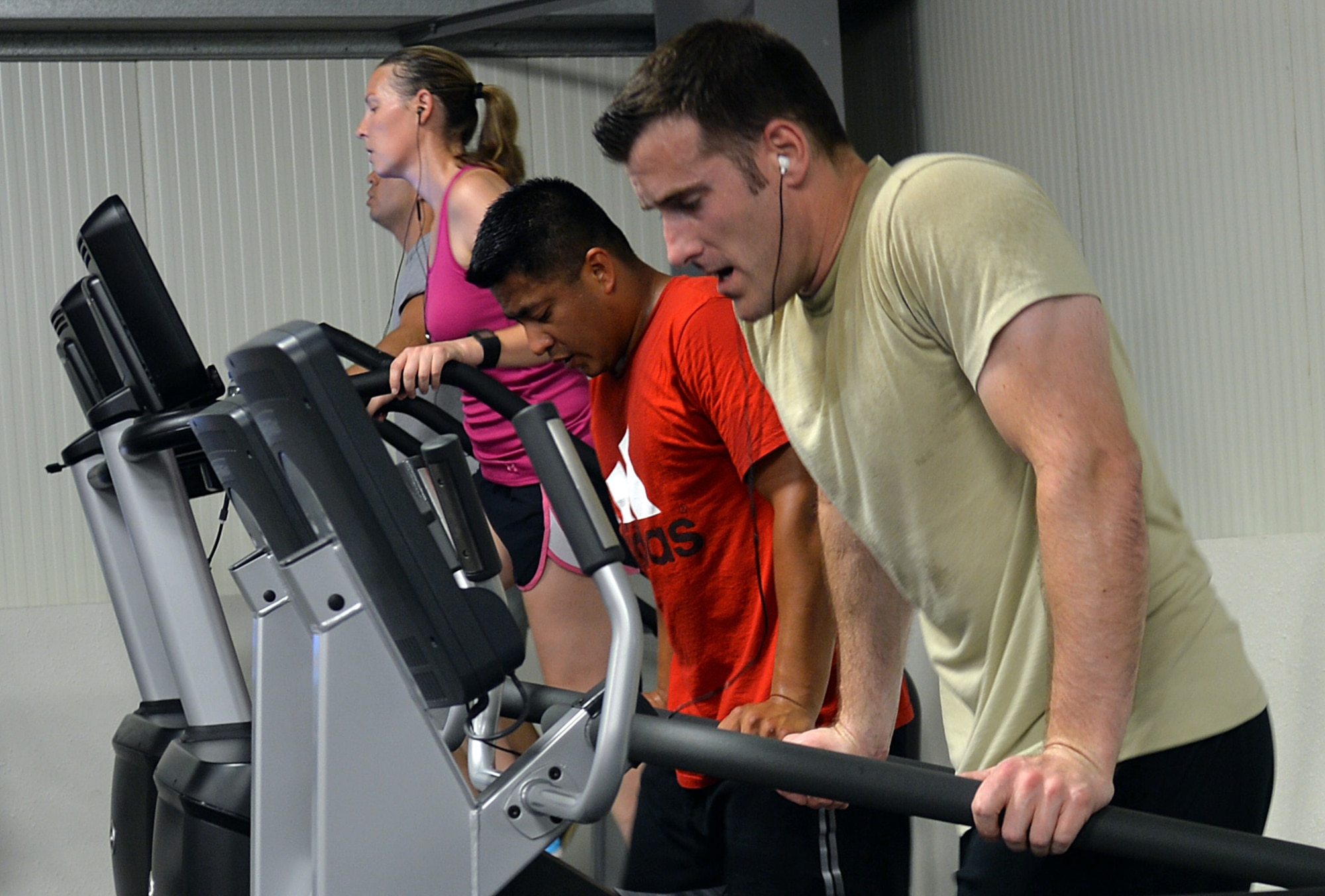 Fitness center patrons work out in the aerobic area of the fitness center at an undisclosed location in Southwest Asia April 17, 2015. The fitness center is available to base personnel 24/7 here. (U.S. Air Force photo/Tech. Sgt. Jeff Andrejcik) 