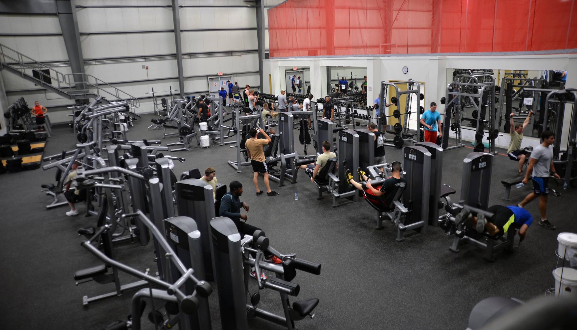 Base personnel work out in the main fitness center at an undisclosed location in Southwest Asia April 17, 2015. The fitness center is available to base personnel 24/7 here.   (U.S. Air Force photo/Tech. Sgt. Jeff Andrejcik)