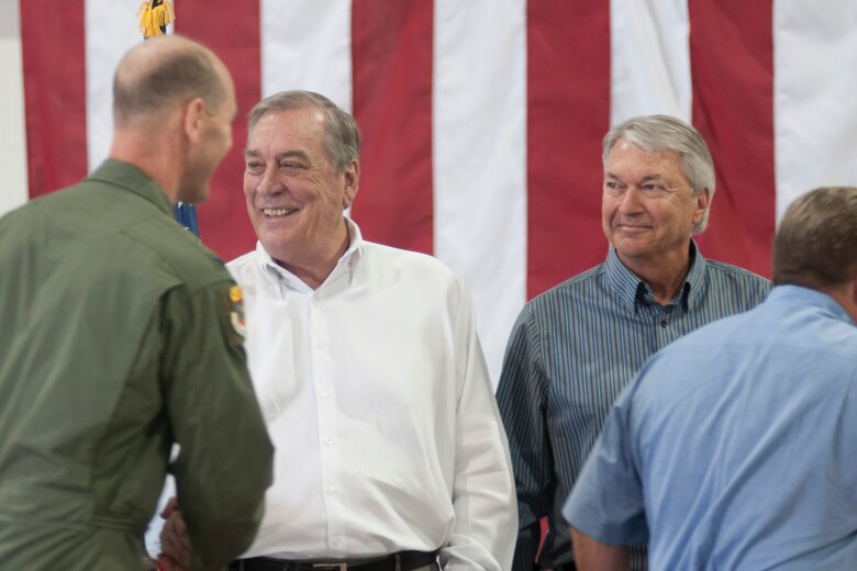 Honorary wing commander Robert McMahon, left, and honorary Operations Group commander Don Pooley, right, are welcomed by Col. Troy Daniels, 214th Reconnaissance Group commander, during the 162nd Wing’s annual awards ceremony April 12. The Honorary Commander Program is a civic outreach initiative to help community leaders learn more about the Air National Guard and its mission, and to help military leaders of the 162nd learn more about the community in which they live. (U.S. Air National Guard photo/Tech. Sgt. Hollie Hansen)