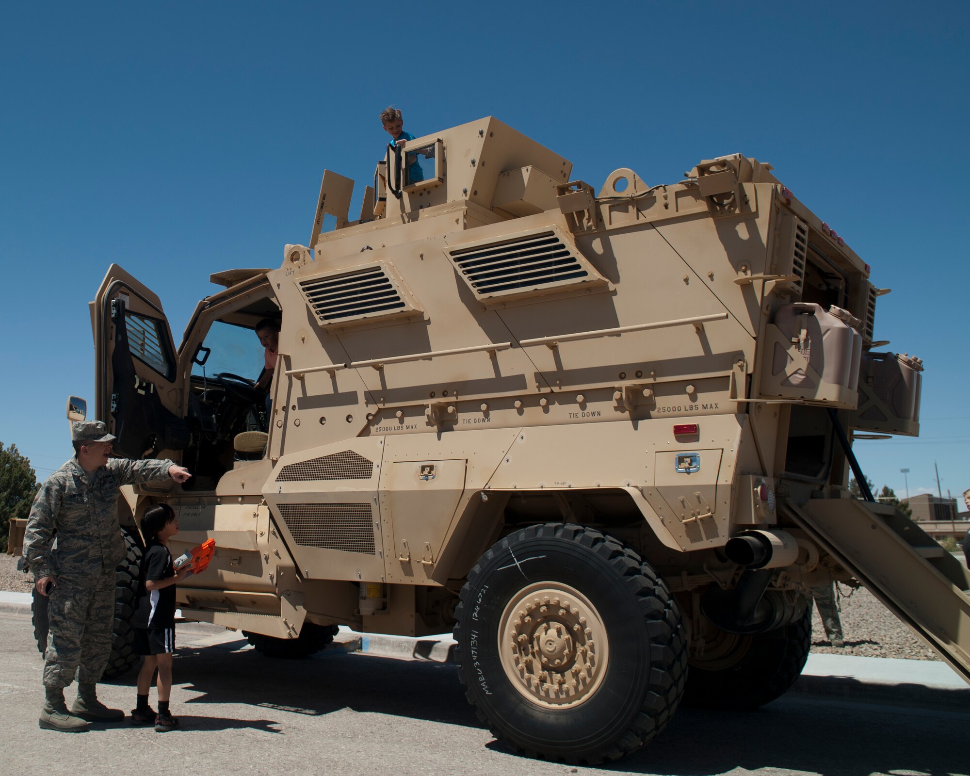 A Mine-Resistant Ambush Protected vehicle was put on display during “bring your child to work day” at Holloman Air Force Base N.M., April 17, 2015. Bring your child to work day gives military members a chance to show their children what their day to day jobs consist of, as well as show off some of the more exciting parts of being in the military. (U.S. Air Force photo by Senior Airman Chase Cannon/ Released)