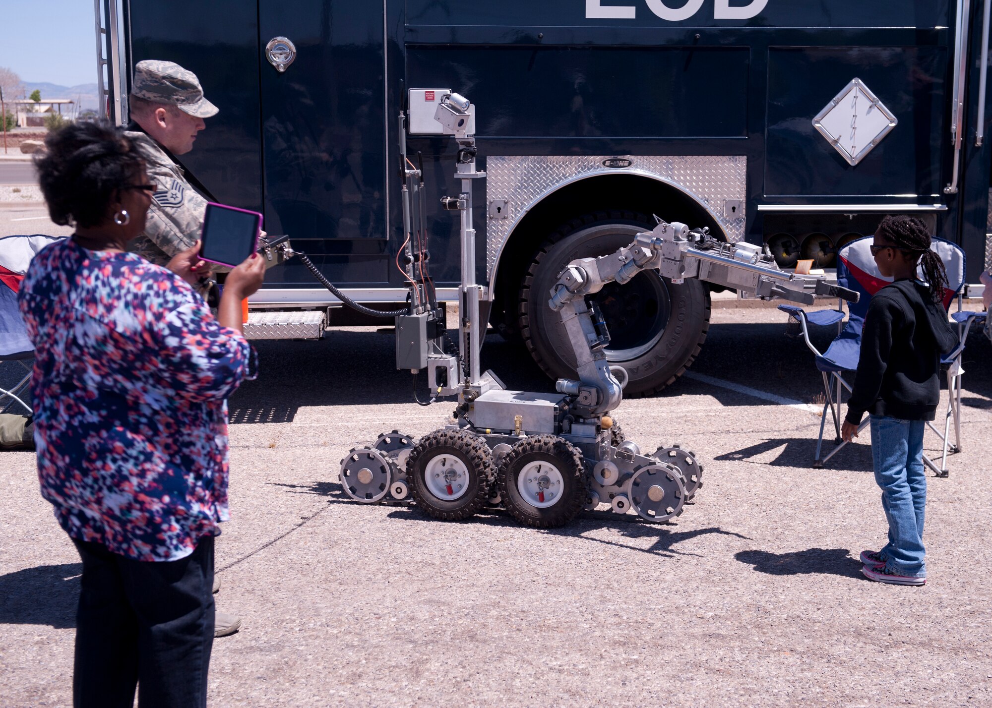 An Explosive Ordinance Disposal robot is shown off for members of Team Holloman at a street show during “bring your child to work day” at Holloman Air Force Base N.M., April 17, 2015. Bring your child to work day gives military members a chance to show their children what their day to day jobs consist of, as well as show off some of the more exciting parts of being in the military. (U.S. Air Force photo by Senior Airman Chase Cannon/ Released)
