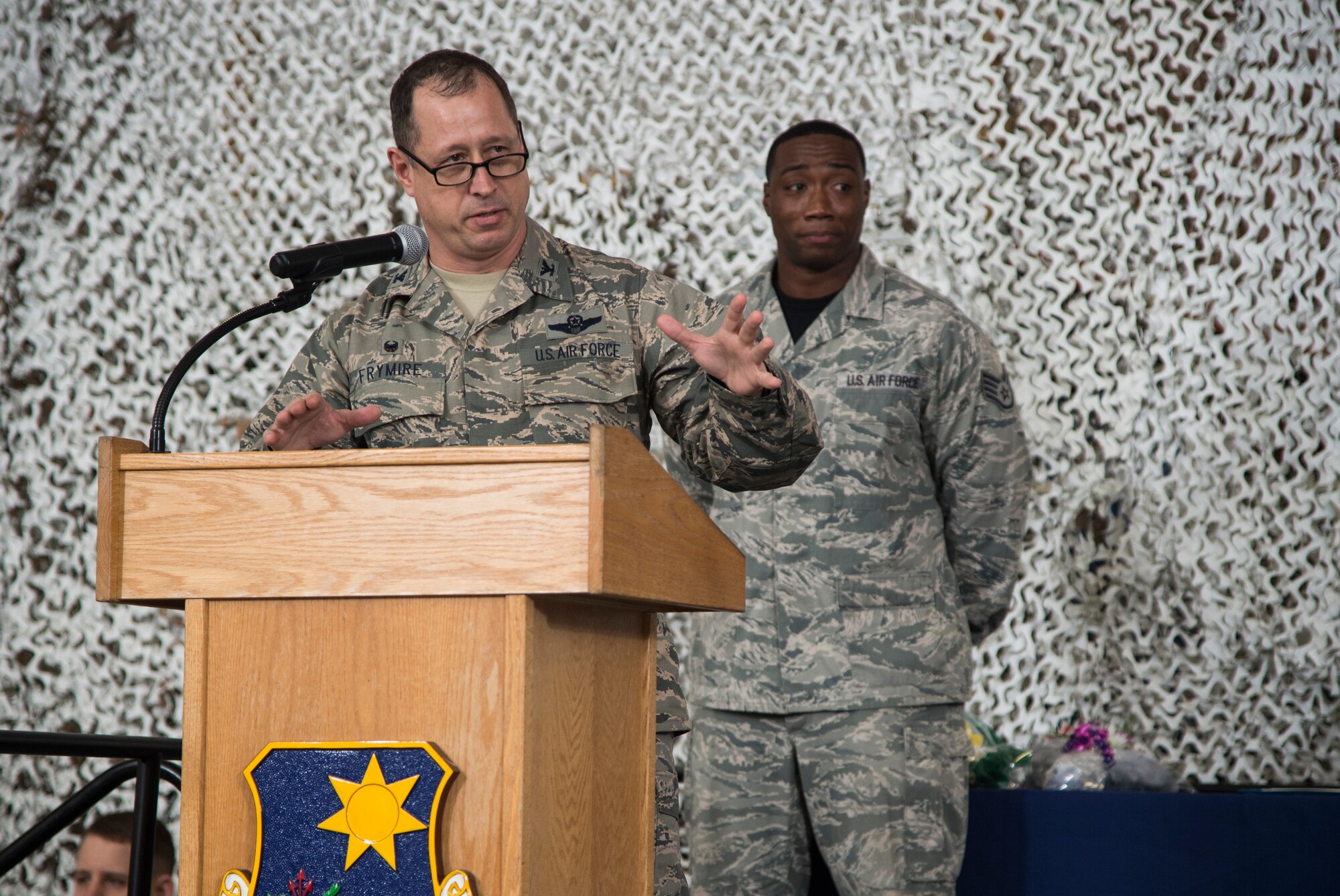 Col. Michael Frymire, 817th Contingency Response Group commander, speaks during the 817th Global Mobility Squadron change of command ceremony at Joint Base McGuire-Dix-Lakehurst, N.J., April 17, 2015. During the ceremony, Lt. Col. Justin Niederer relinquished command as Lt. Col. Donovan Davis assumed command. (U.S. Air Force photo/Staff Sgt. Gustavo Gonzalez)