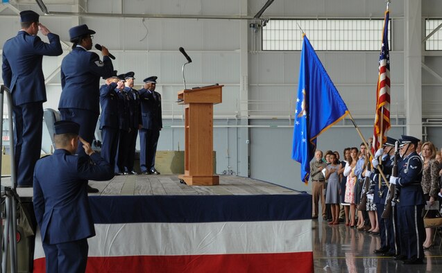 Tech. Sgt. Anjelica Kaylor, NCO in-charge of 2nd Force Support Squadron career development, sings the National Anthem during the Eighth Air Force Change of Command ceremony on Barksdale Air Force Base, La., April 17, 2015. The Eighth Air Force team consists of more than 16,000 Airmen operating and maintaining a variety of aircraft capable of deploying air power to any area of the world. (U.S. Air Force photo/Senior Airman Kristin High)