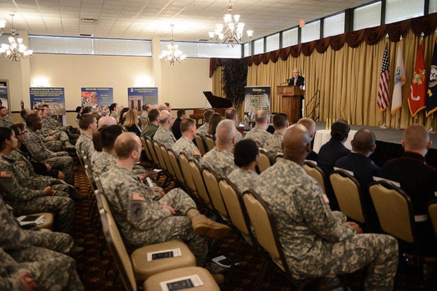 Dr. Charles Rojer, Holocaust survivor and Days of Remembrance guest speaker, shares his story with the joint base community during the annual event on Joint Base McGuire-Dix-Lakehurst, N.J. April 16, 2015. This year marks the 70th anniversary since concentration camps were liberated by allied forces. (U.S. Air Force photo by Airman 1st Class Joshua King)