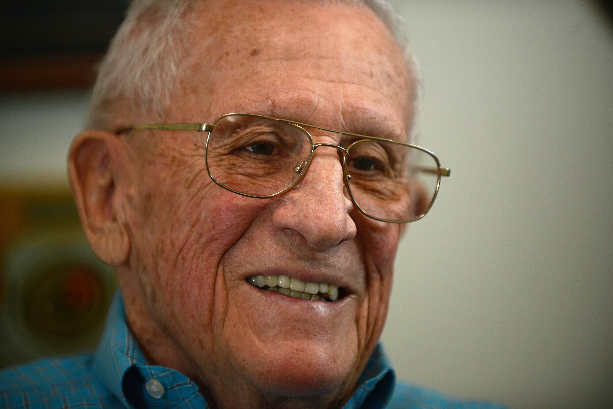 Retired U.S. Air Force Lt. Col. Allen Lamb, former Wild Weasel pilot, answers questions during an interview at Lumberton, North Carolina, March 25, 2015. Lamb, one of the original Wild Weasel pilots, served in Vietnam providing the suppression of enemy air defenses. (U.S. Air Force photo by Airman 1st Class Michael Cossaboom/Released) 