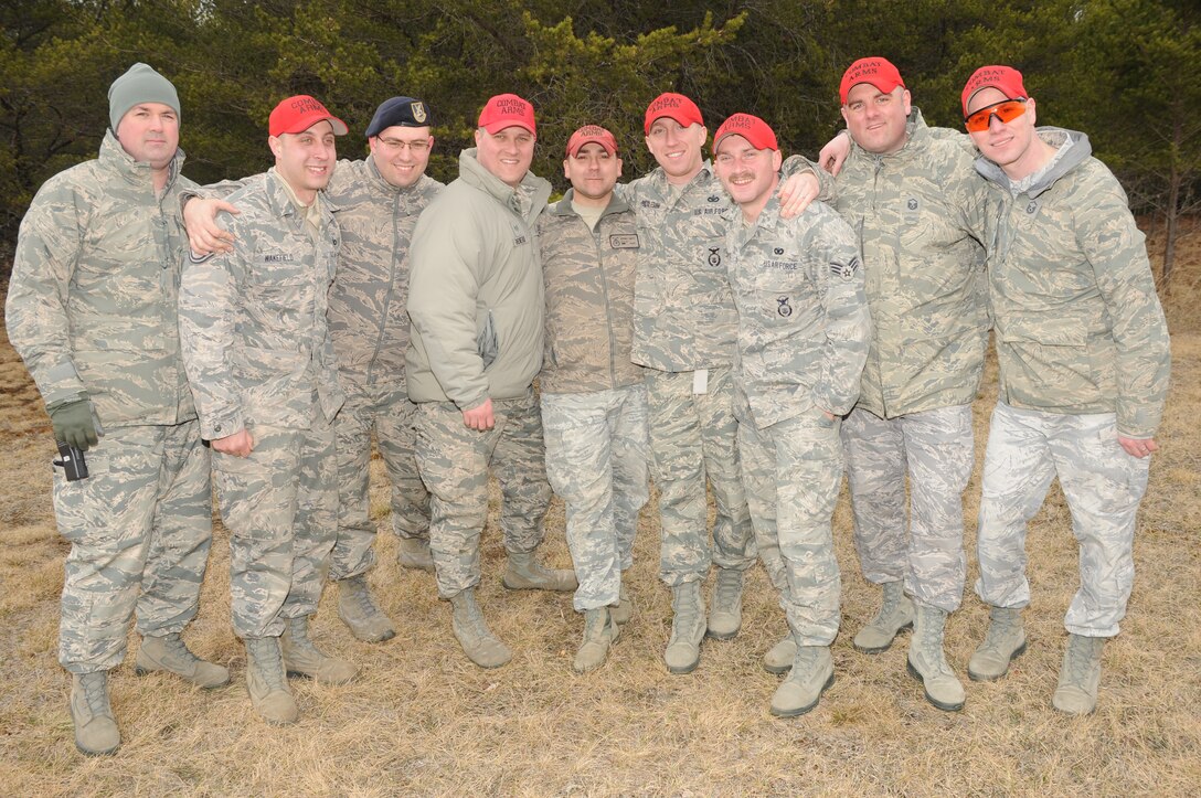 914th Security Forces Squadron Combat Arms Training and Maintenance instructors pose for a picture at Canadian Forces Base Borden, ON, Canada on April 10, 2015. The 914 SFS traveled to CFB Borden for heavy weapons training. (U.S. Air Force photo by Staff Sgt. Matthew Burke)
