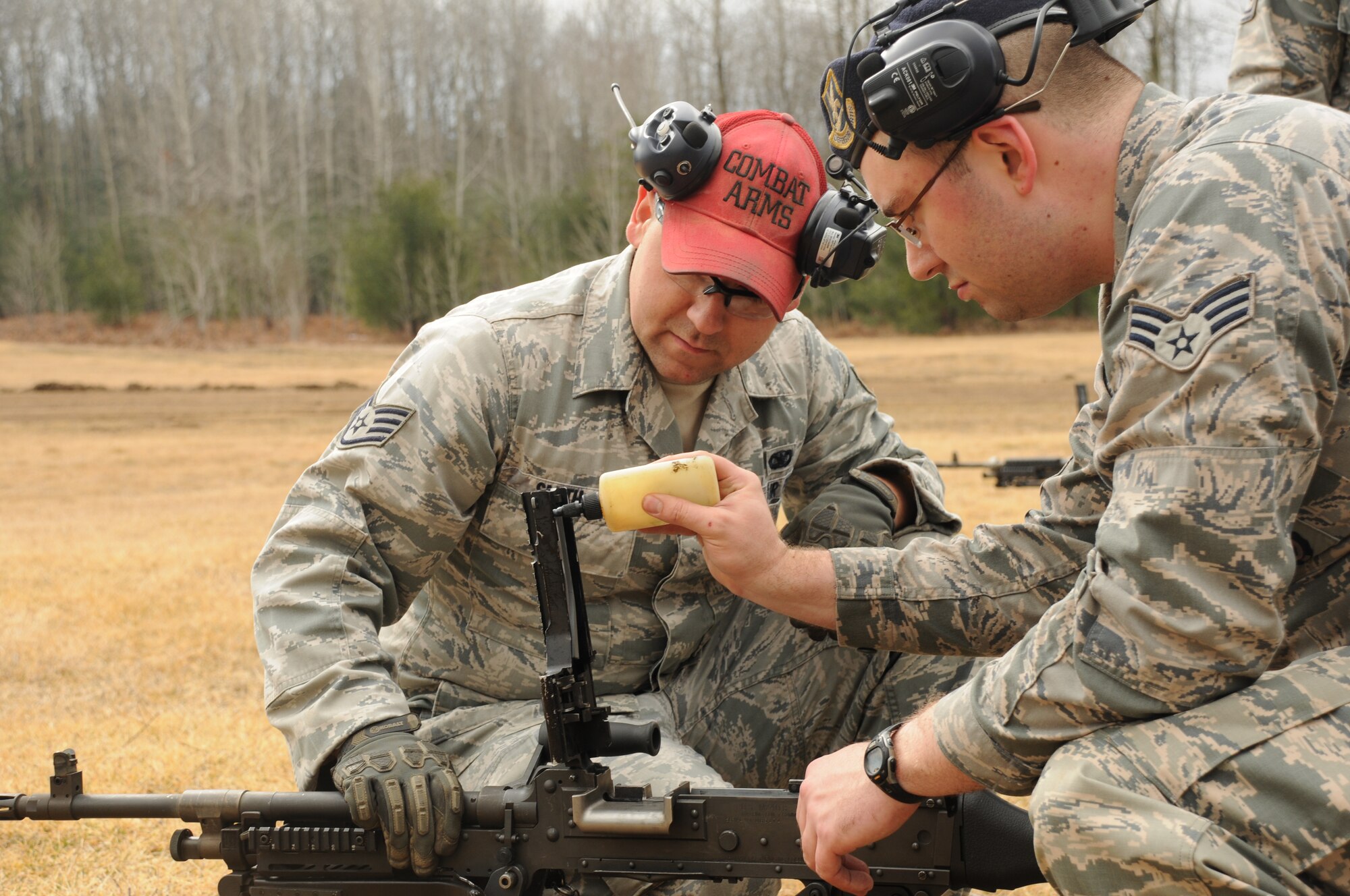 914th Security Forces Squadron Combat Arms instructors prepare weapons for use at Canadian Forces Base Borden, ON, Canada on April 10, 2015. The 914 SFS traveled to CFB Borden for heavy weapons training. (U.S. Air Force photo by Staff Sgt. Matthew Burke)