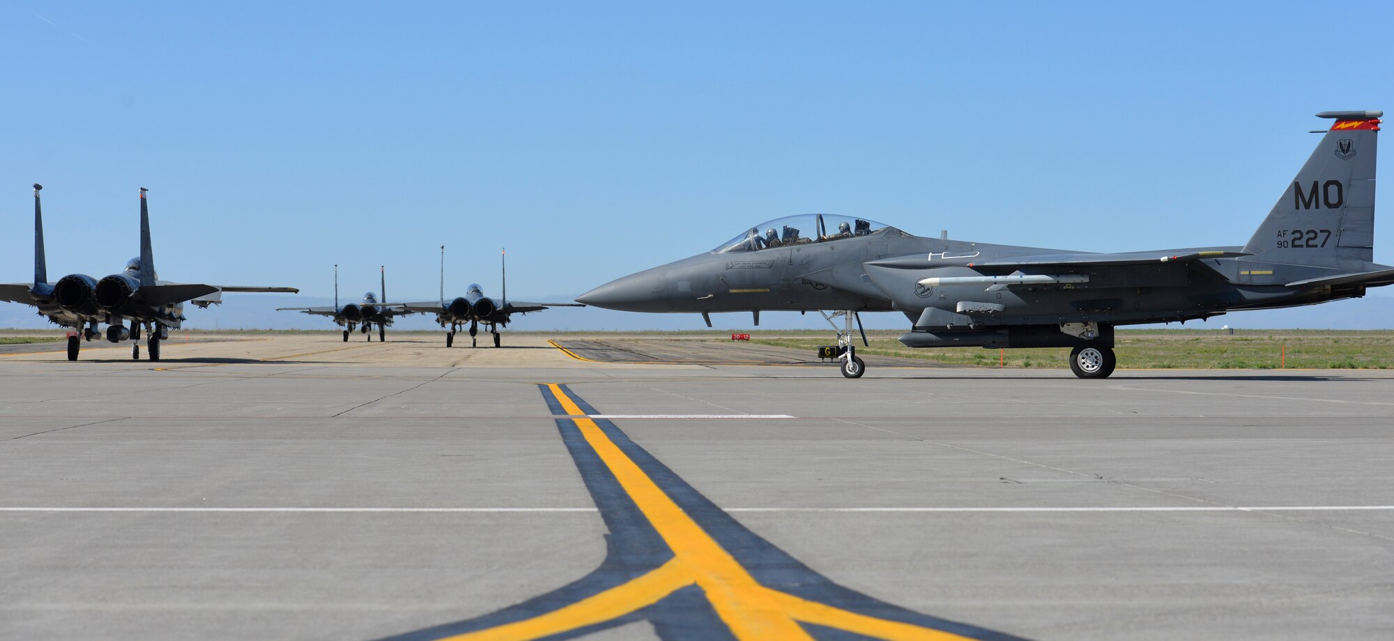 F-15E Strike Eagles assigned to the 389th Fighter Squadron taxi before take off from Mountain Home Air Force Base, Idaho, April 13, 2015 during Gunfighter Flag 15-2. The F-15E is a dual-role fighter designed to perform air-to-air and air-to-ground missions. (U.S. Air Force photo by Senior Airman Lauren-Taylor Levin/Released)