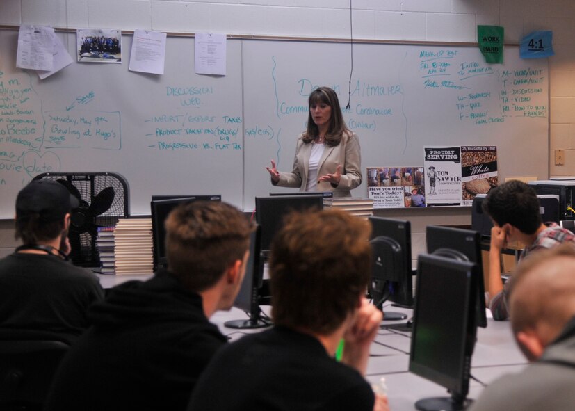 Dawn Altmaier, 92nd Air Refueling Wing community support coordinator, talks with students April 15, 2015, at Cheney High School in Cheney, Wash. Altmaier was invited by a student to speak during the Distributive Education Clubs of America class. The organization is an international association of high school and college students that prepares leaders and entrepreneurs for careers and education in marketing, finance, hospitality, management and other business areas. Altmaier spoke with the students about what she does in the business world and how her job is important and makes an impact. (U.S. Air Force photo/Airman 1st Class Taylor Bourgeous)