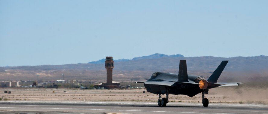 A 61st Fighter Squadron F-35 from Luke Air Force Base, Arizona, takes off from the Nellis AFB, Nevada, flightline April 15, 2015. (U.S. Air Force photo by Senior Airman Thomas Spangler)