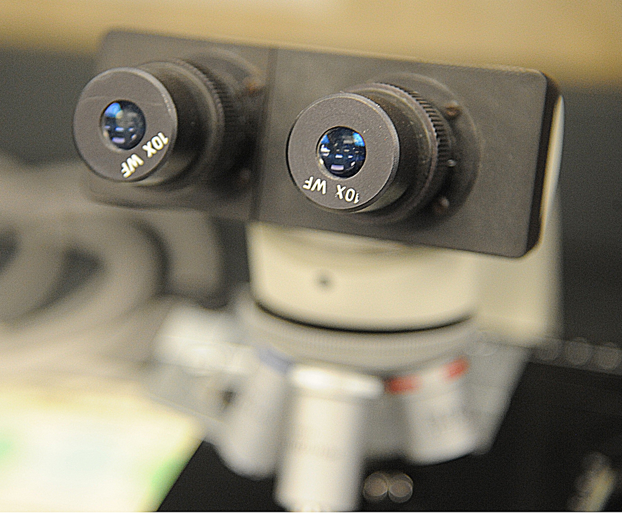 A microscope sits dormant at Whiteman Air Force Base, Mo., April 1, 2015. The microscope is used to view harmful bacteria, enabling the vets to identify the problem at hand. (U.S. Air Force photo by Senior Airman Keenan Berry/Released)
