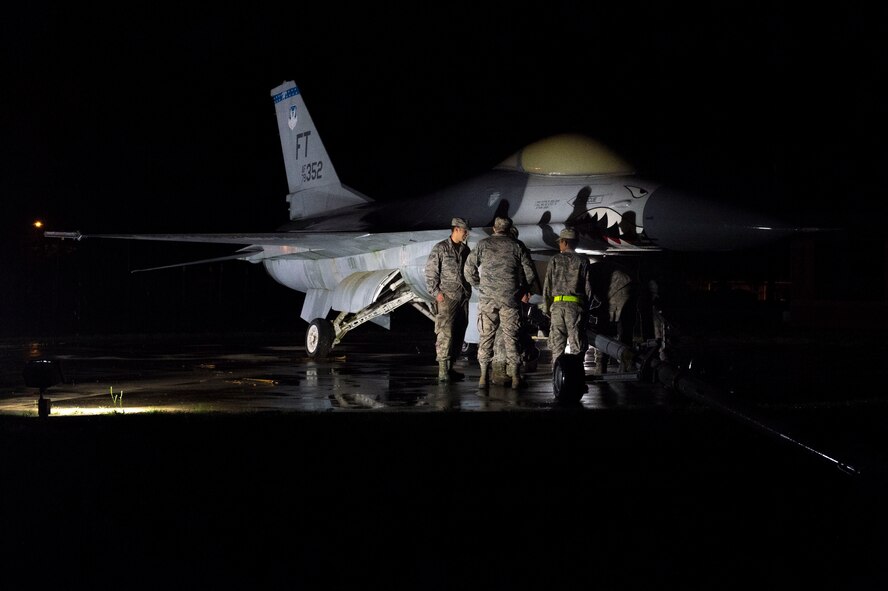 The 23d Equipment Maintenance Squadron prepares an F-16 Fighting Falcon static display for transportation April 13, 2015, at Moody Air Force Base, Ga. The 23d EMS fabrication flight will use their newly modernized paint facility to restore the aircraft’s appearance. (U.S. Air Force photo by Airman 1st Class Dillian Bamman/Released)