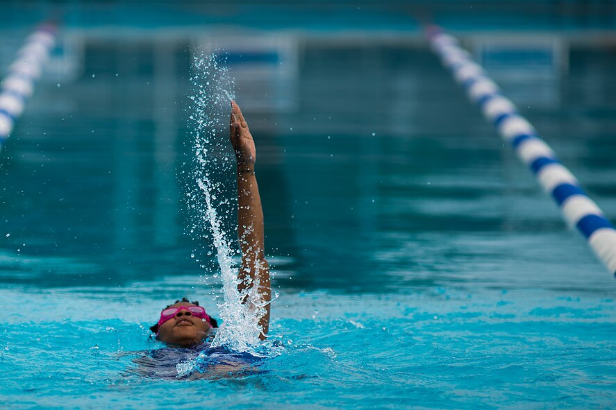 Porscha Howard, an Air Force Wounded Warrior athlete, swims laps during the fourth day of an introductory adaptive sports and rehabilitation camp at Eglin Air Force Base, Fla., April 16. The DOD’s military adaptive sports program enhances warrior recovery by engaging wounded, ill and injured service members in ongoing, daily adaptive activities, based on their interest and ability. (U.S. Air Force photo/Samuel King Jr.)