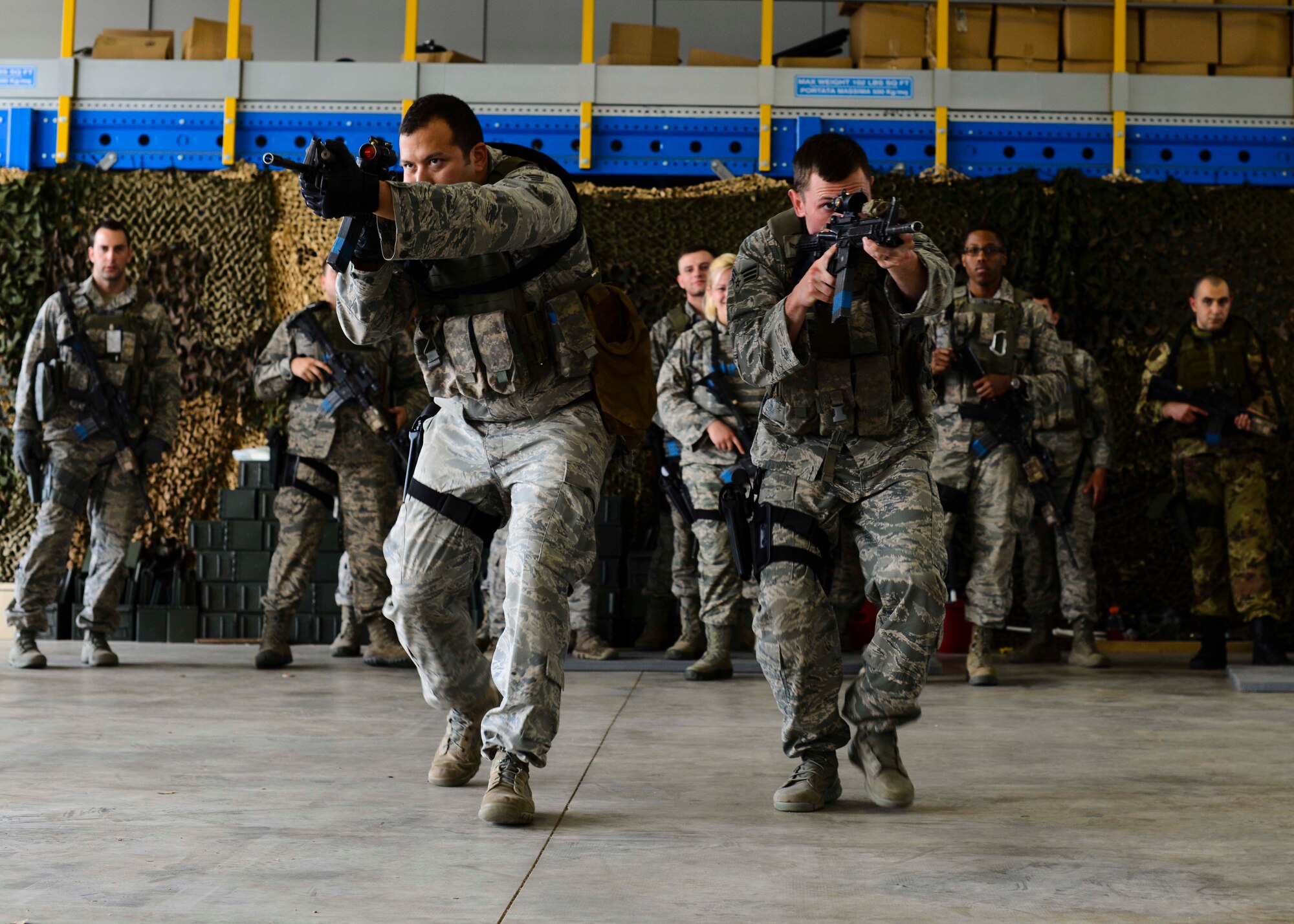 Airmen from the 31st Security Forces Squadron practice target tracking during a week-long combat expertise training program, April 14, 2015, at Aviano Air Base, Italy. Airmen learned several different building-block motions to better familiarize themselves with more complex maneuvers. (U.S. Air Force photo by Senior Airman Austin Harvill/Released)